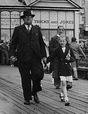 photograph: Charlie Dumville (b 1890) and his granddaughter Carole, Blackpool Pier 1952
