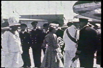 With the Governor of Kenya, Sir Philip Mitchell, Princess Elizabeth talks with the Captain of the BOAC Argonaut 'Atalanta' in which she and the Duke of Edinburgh flew to Nairobi on 1st February 1952.