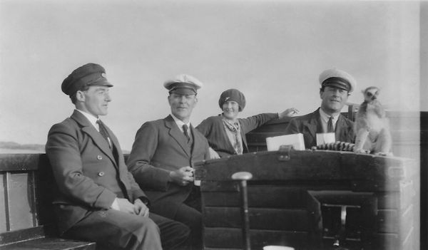 Patrick Kelly, Bobby Dunville, Mrs. John Dunville, Tommy Thompson, a lemur